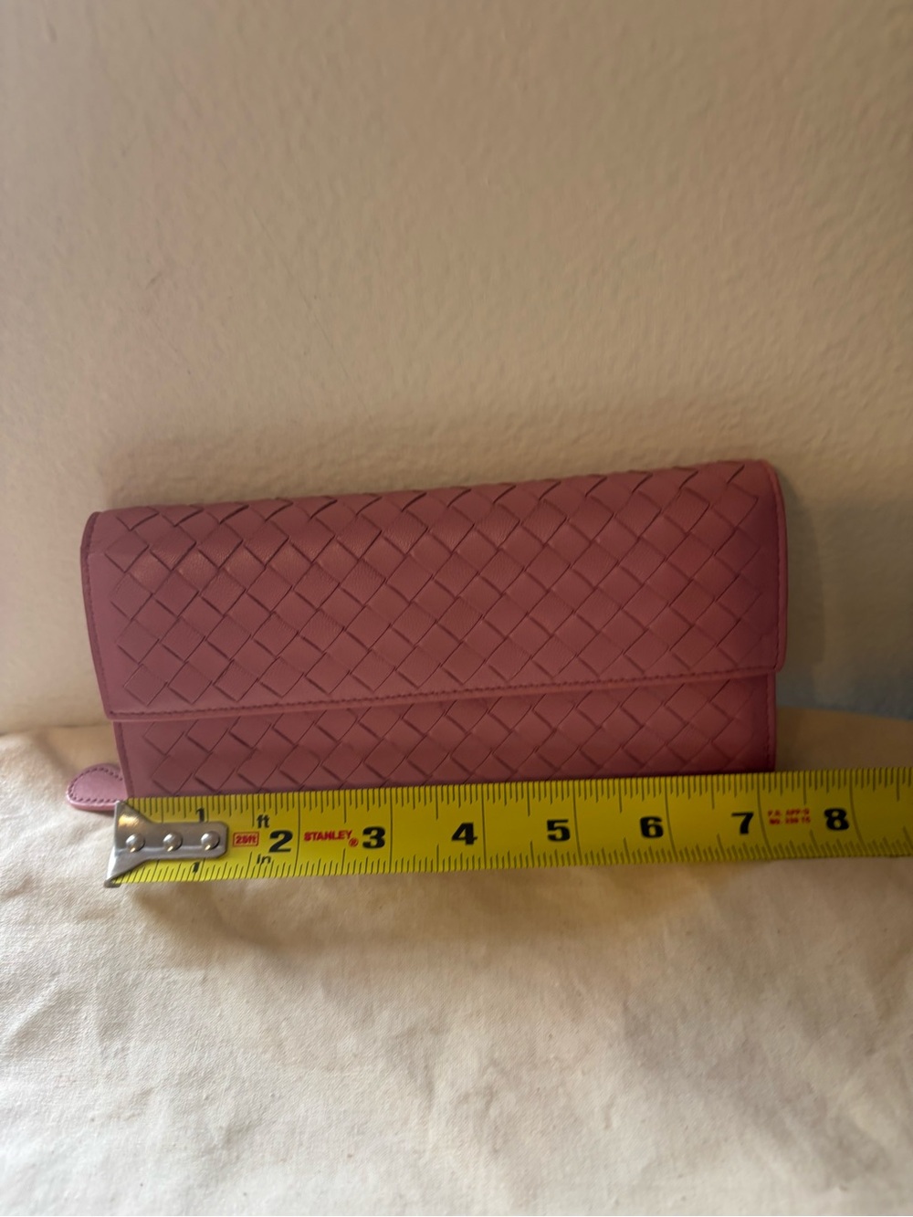 Soft pink Bottega Veneta Intrecciato woven-leather long continental wallet.